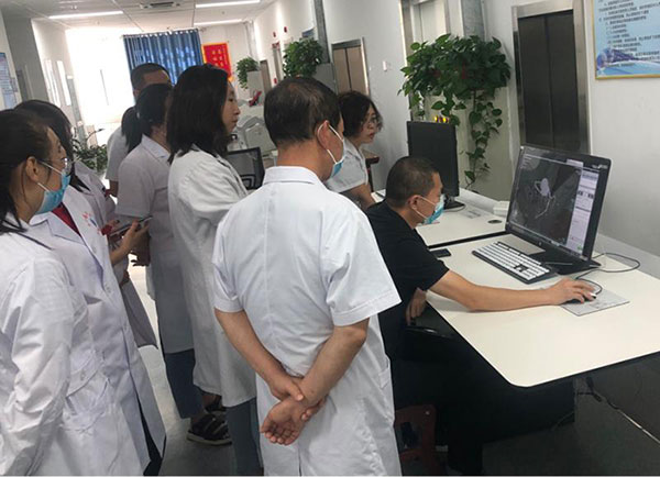 图4-我院医学影像科专家与山西白求恩医院心内科专家联合阅片为患者制定最优治疗方案.jpg